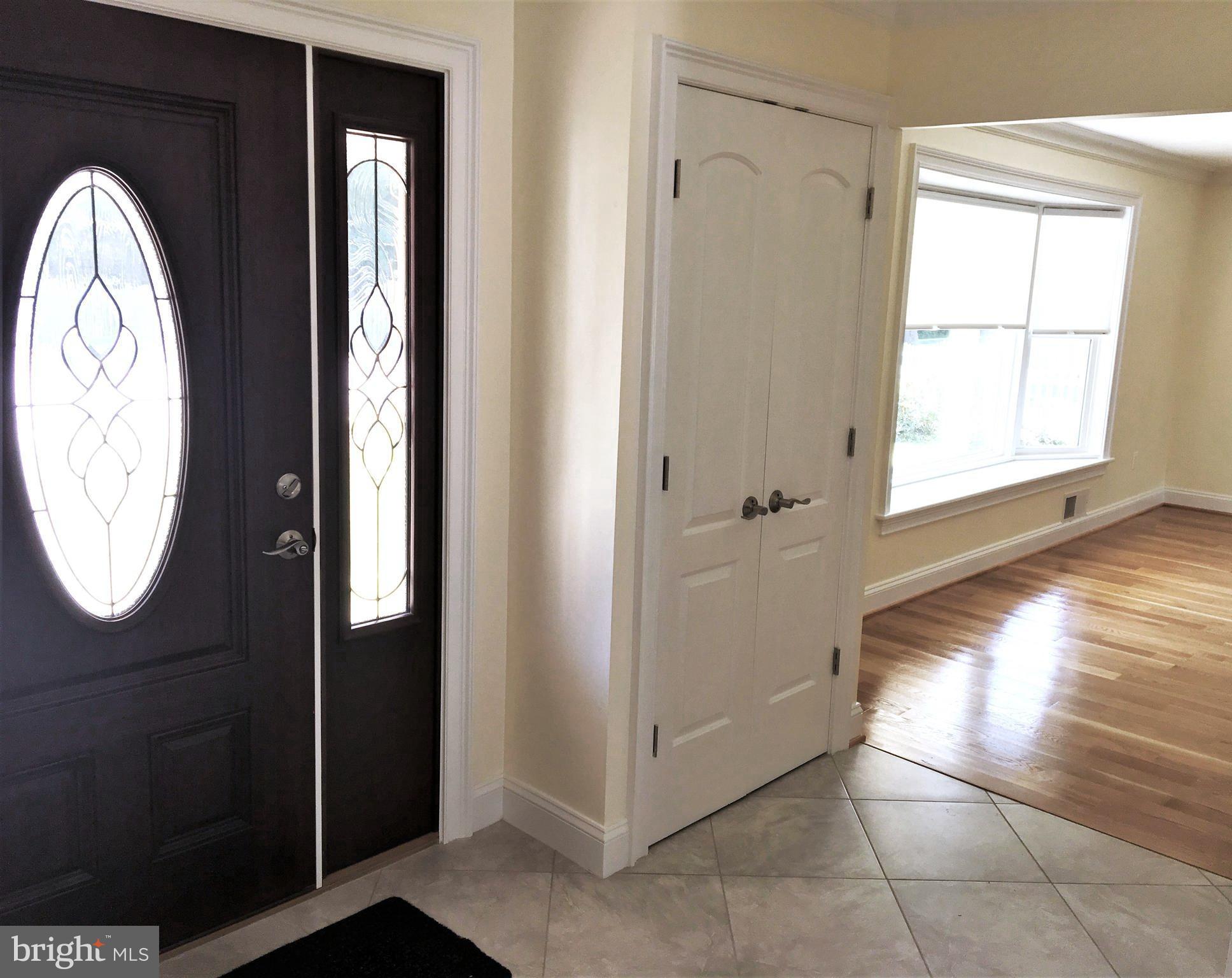 11514 Seven Locks Road Potomac, MD 20854 - Photo 16 of 72 a view of a bathroom with wooden floor and a window