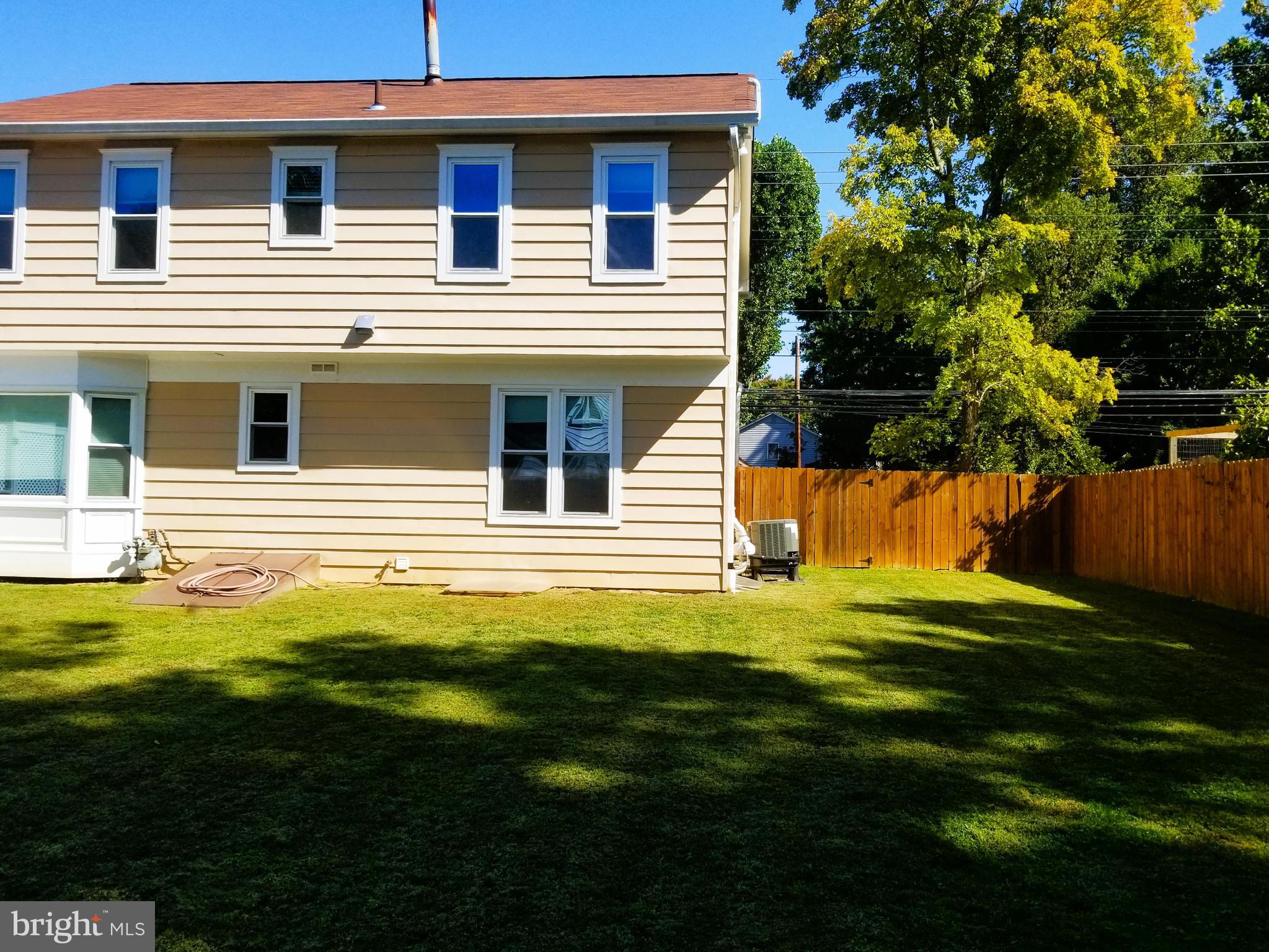 11514 Seven Locks Road Potomac, MD 20854 - Photo 67 of 72 a house that has a big yard in front of it