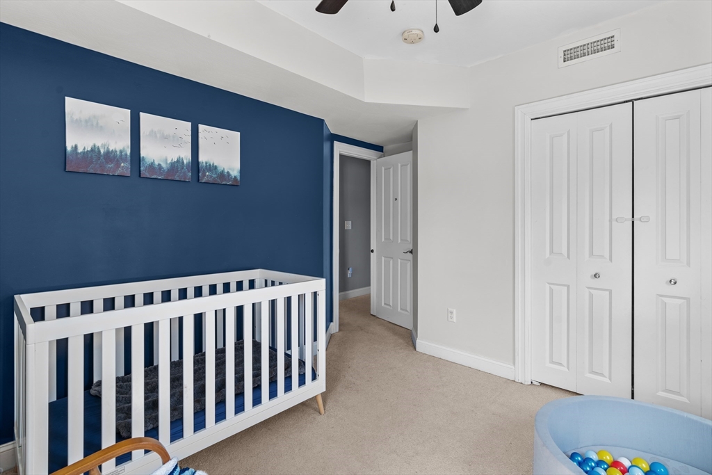 146 South Pleasant Street, Unit 146 Haverhill, MA 01835 - Photo 19 of 28 a view of a hallway with front door