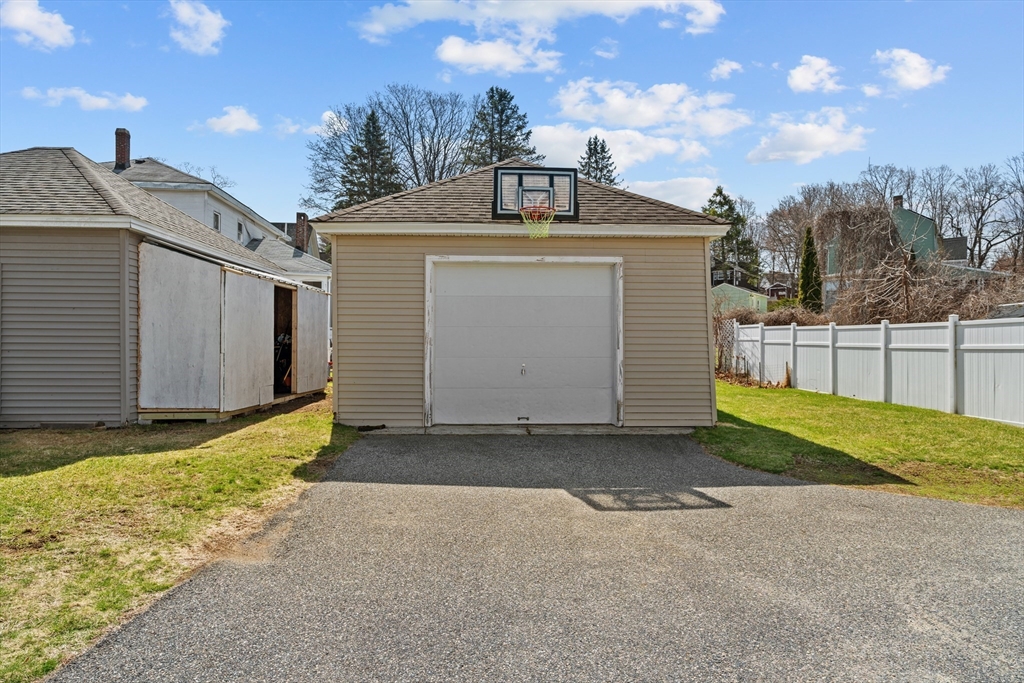 146 South Pleasant Street, Unit 146 Haverhill, MA 01835 - Photo 24 of 28 a front view of a house with a yard