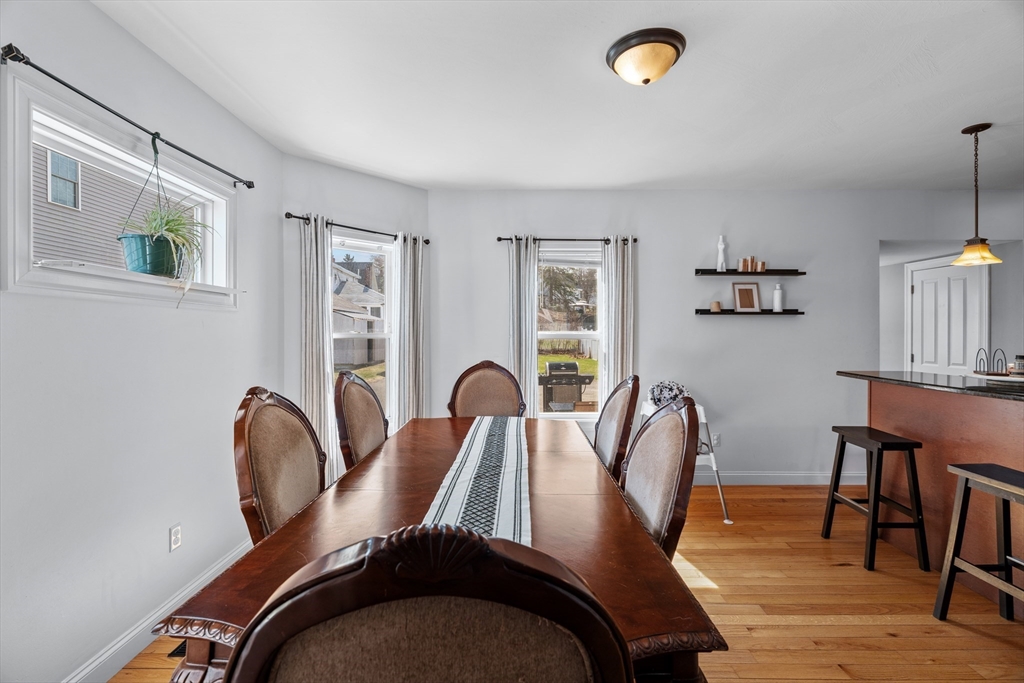 146 South Pleasant Street, Unit 146 Haverhill, MA 01835 - Photo 5 of 28 a view of a dining room with furniture and window