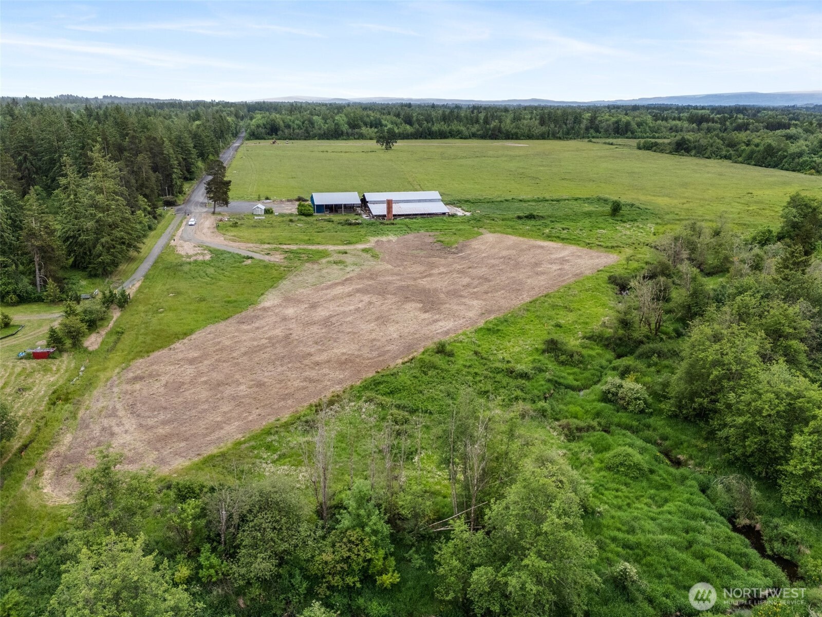 235 Allison Road Ethel, WA 98542 - Photo 14 of 20 a view of a field with a big yard