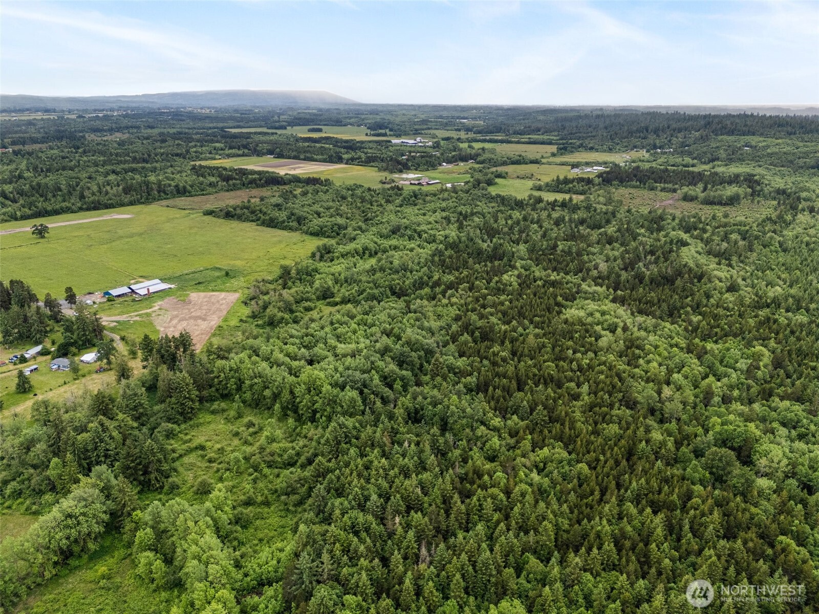 235 Allison Road Ethel, WA 98542 - Photo 18 of 20 a view of a city and an ocean