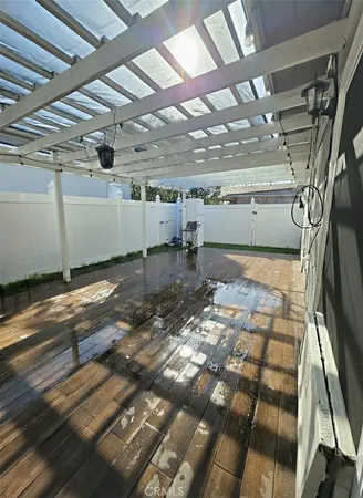 a view of a house with backyard and garden
