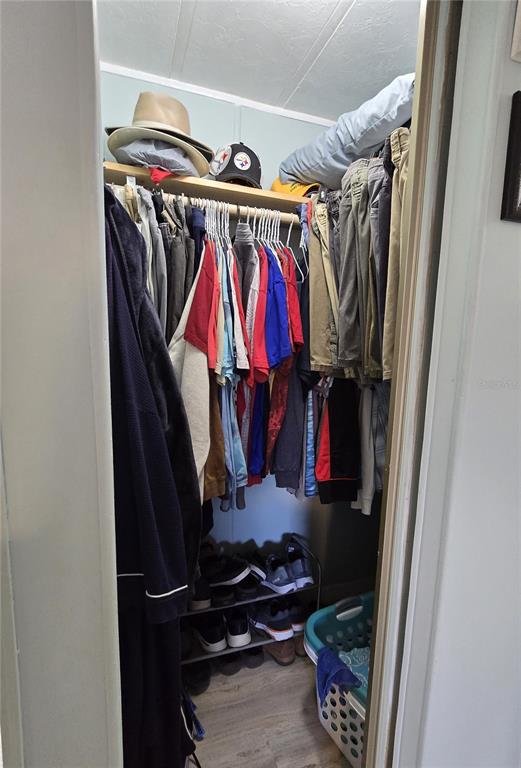 5619 Bayshore Road, Unit 435 Palmetto, FL 34221 - Photo 28 of 56 a view of walk in closet with clothes