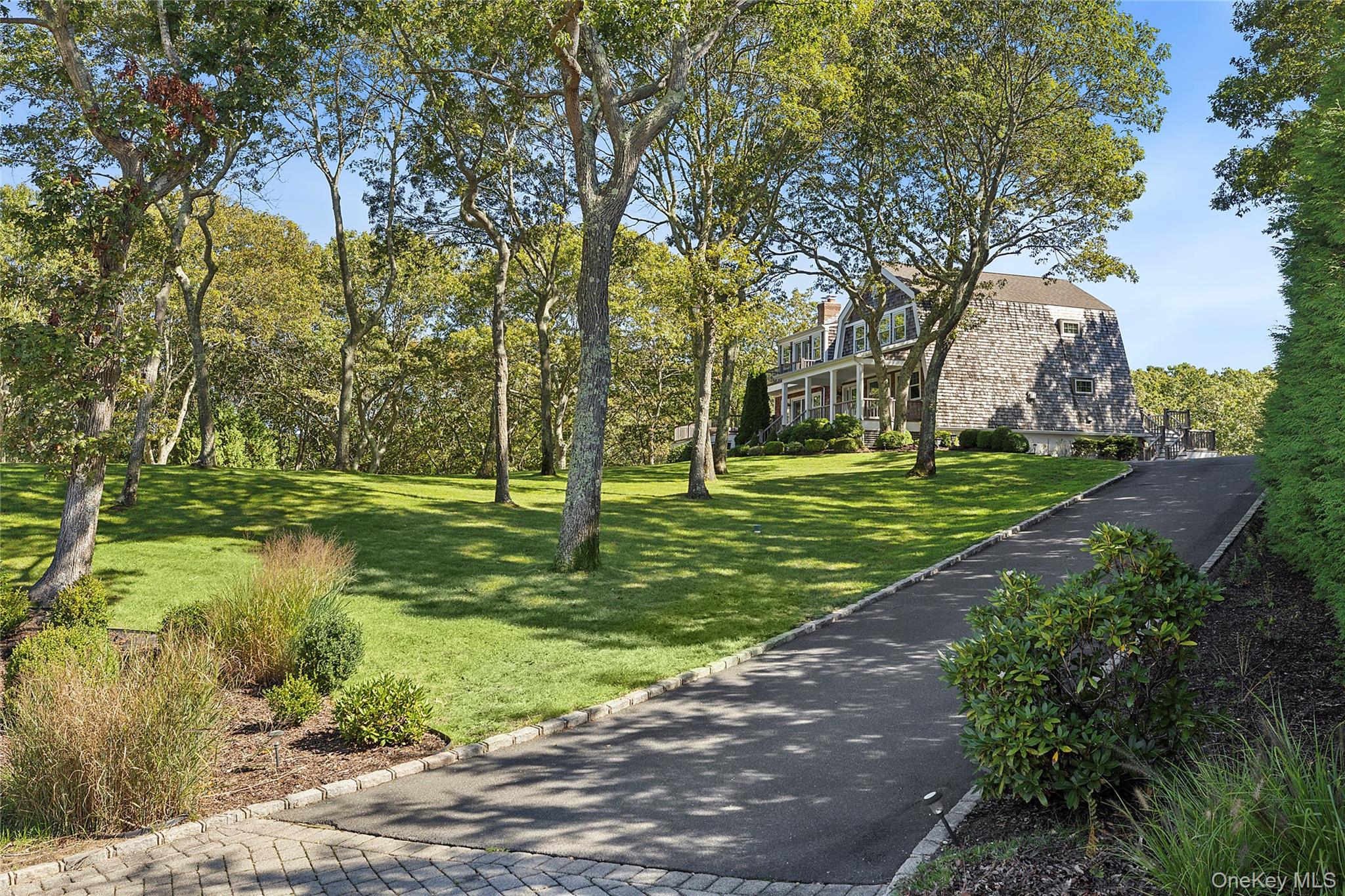 22 Old Trail Road Water Mill, NY 11976 - Photo 2 of 38 a view of a park with large trees