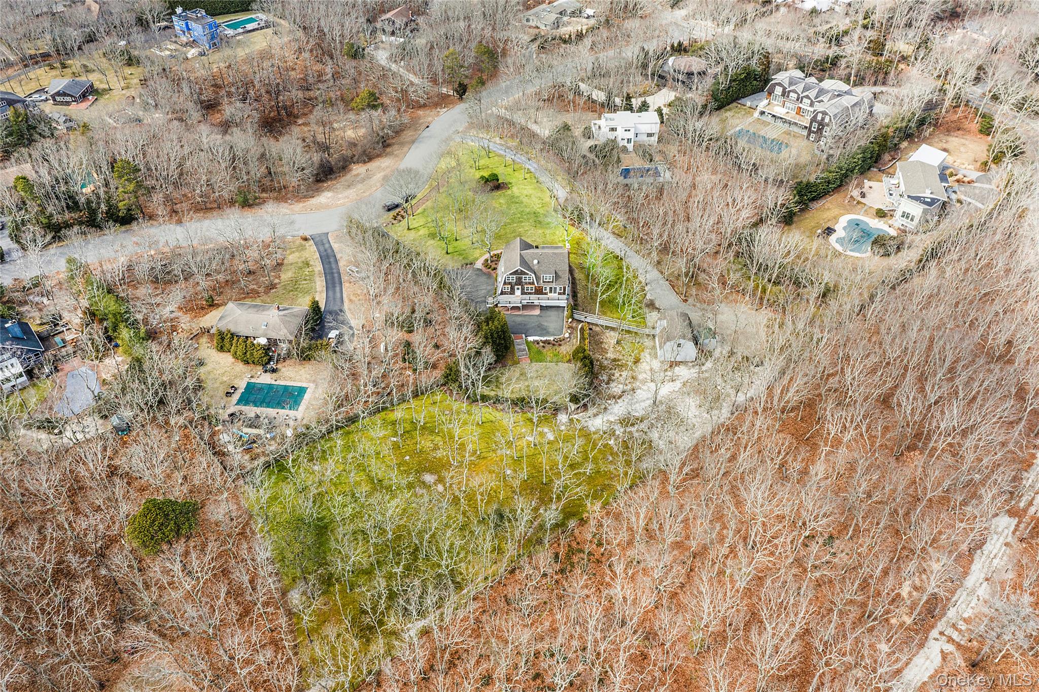 22 Old Trail Road Water Mill, NY 11976 - Photo 30 of 38 a aerial view of a house with a yard