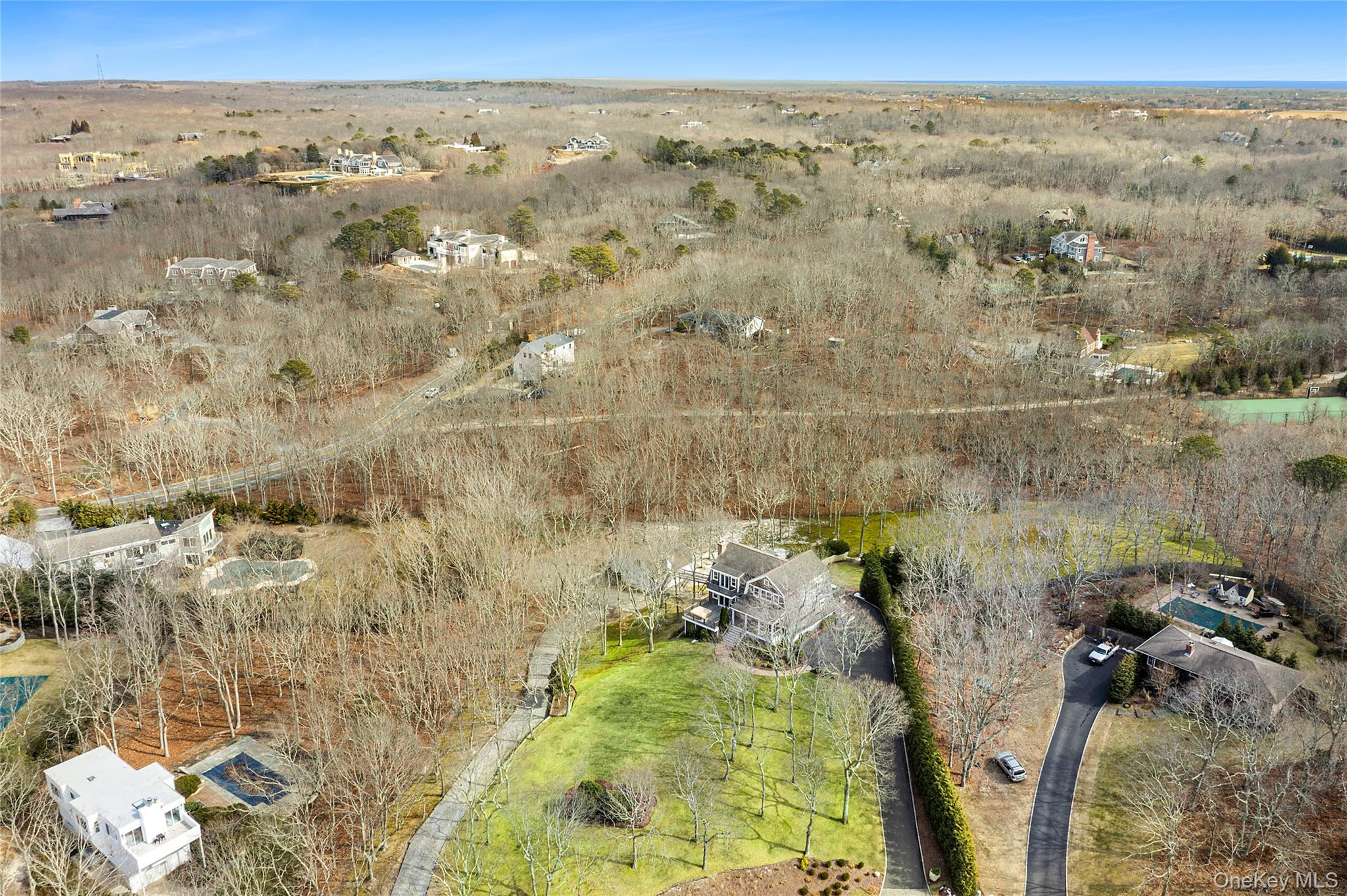 22 Old Trail Road Water Mill, NY 11976 - Photo 34 of 38 an aerial view of a houses with a yard