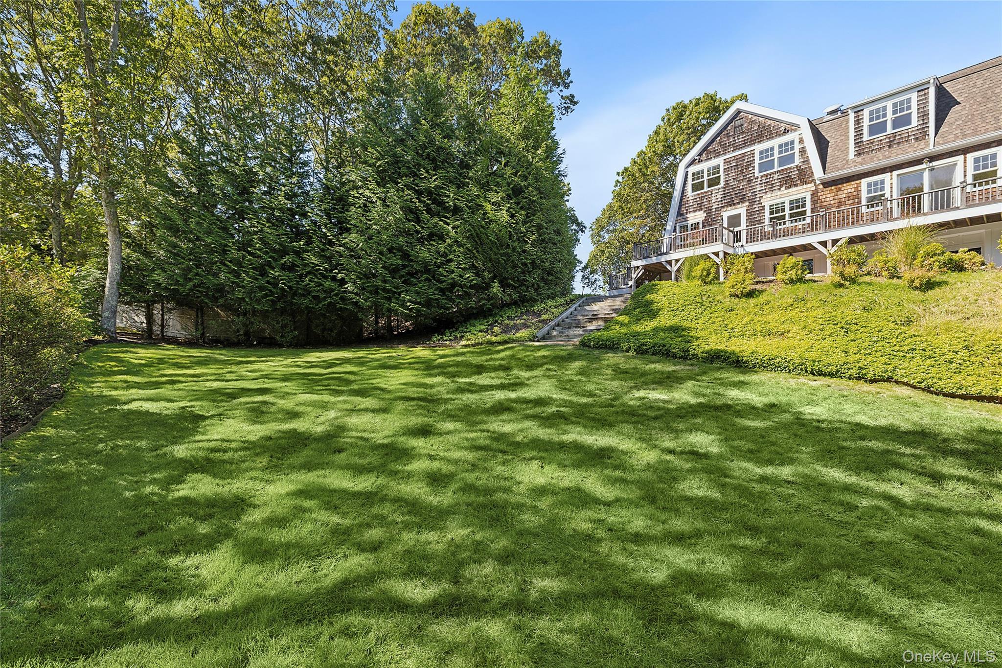 22 Old Trail Road Water Mill, NY 11976 - Photo 36 of 38 a view of an apartment with a garden