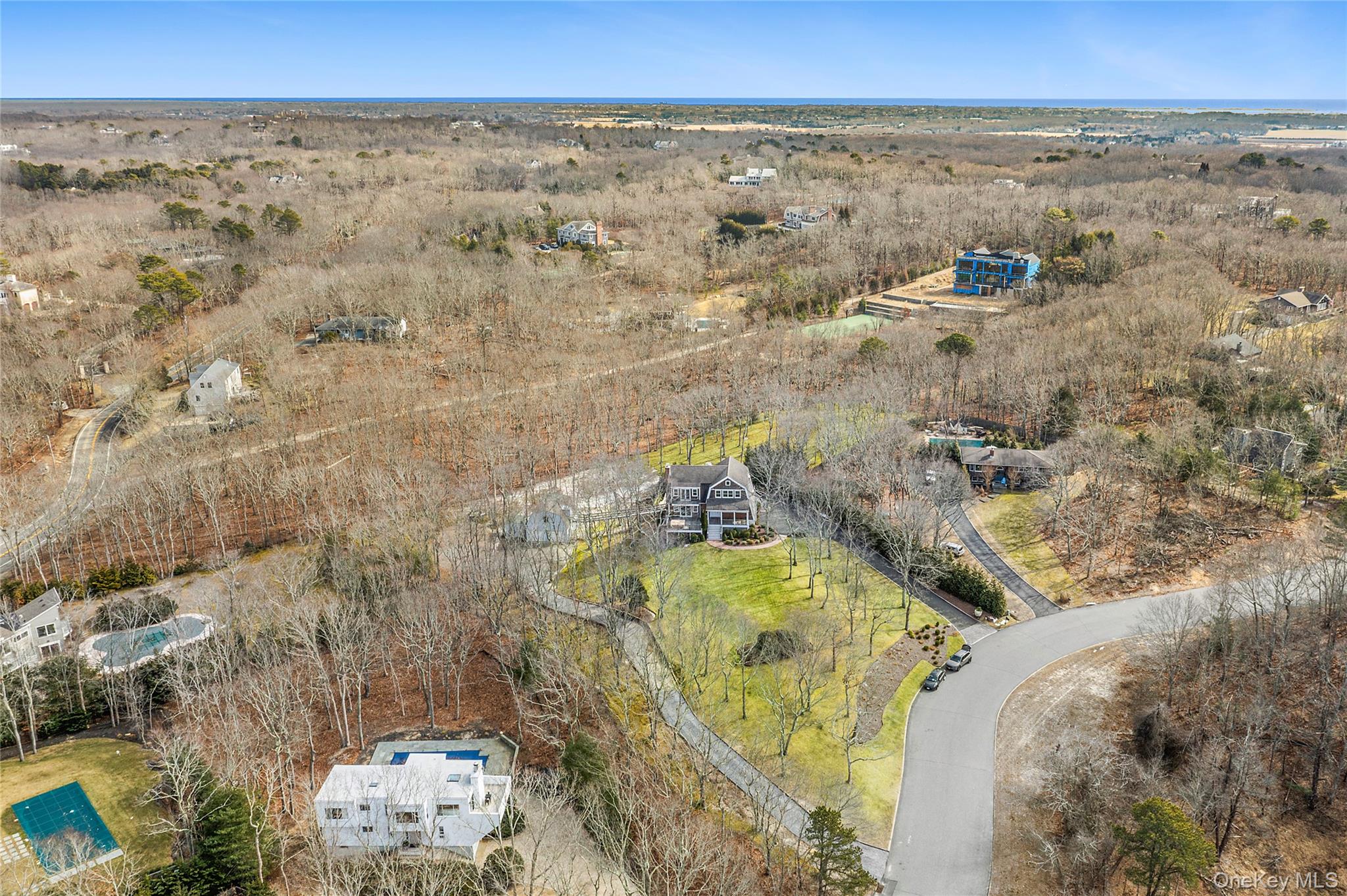22 Old Trail Road Water Mill, NY 11976 - Photo 4 of 38 an aerial view of a house with a yard