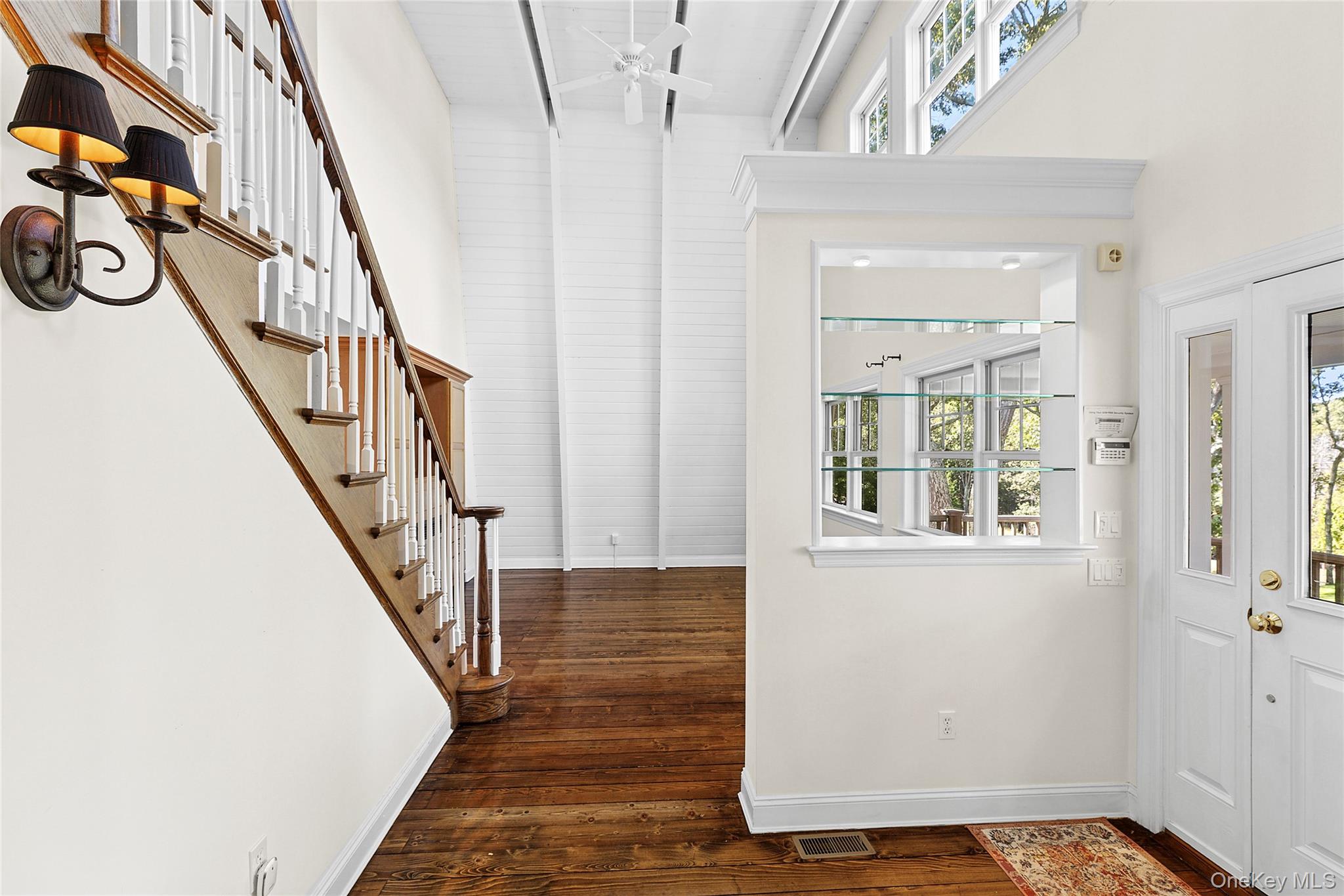 22 Old Trail Road Water Mill, NY 11976 - Photo 6 of 38 a view of an entryway with wooden floor