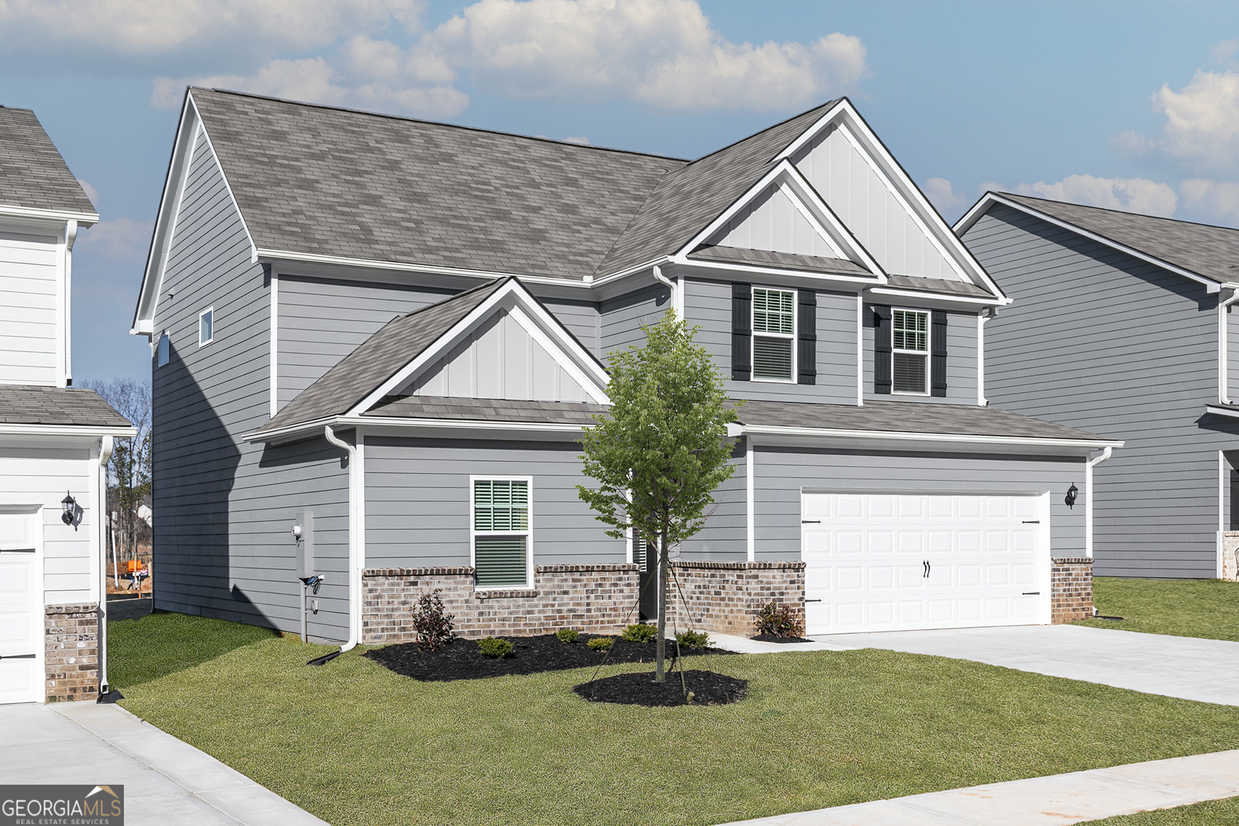 661 Mackenzie Cove Villa Rica, GA 30180 - Photo 3 of 18 front view of a house with a yard