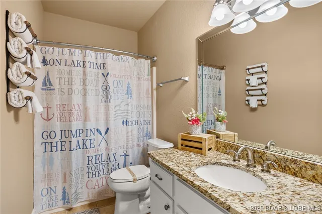 $949,900 | 228 East Lake Court, Sunrise Beach, MO 65079