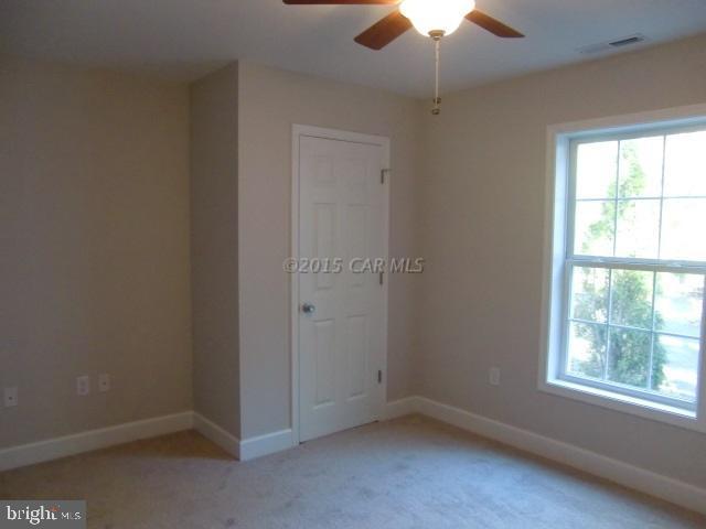 27 Canal Road Ocean Pines, MD 21811 - Photo 19 of 23 an empty room with a window