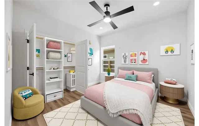 a bedroom with a bed and dresser