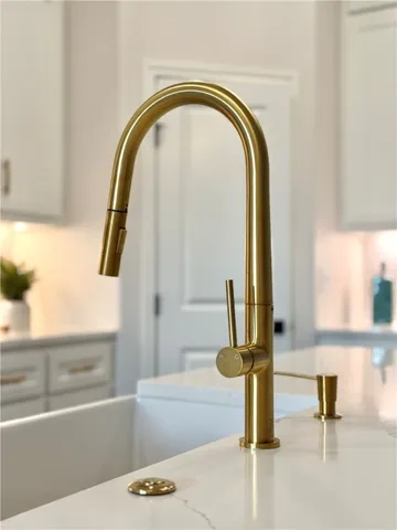 a bathroom with a tub and a window