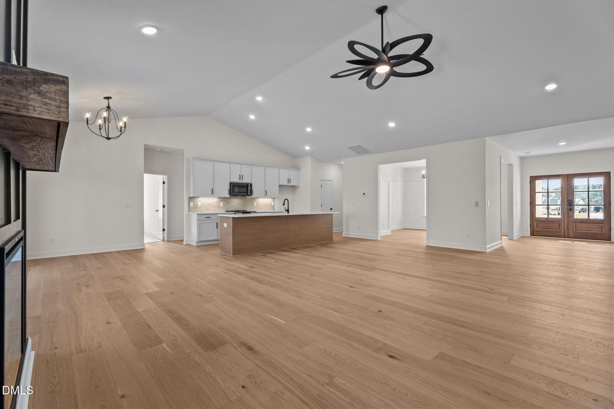 2396 Heartland Road Battleboro, NC 27809 - Photo 26 of 49 a view of an empty room with a window and a kitchen