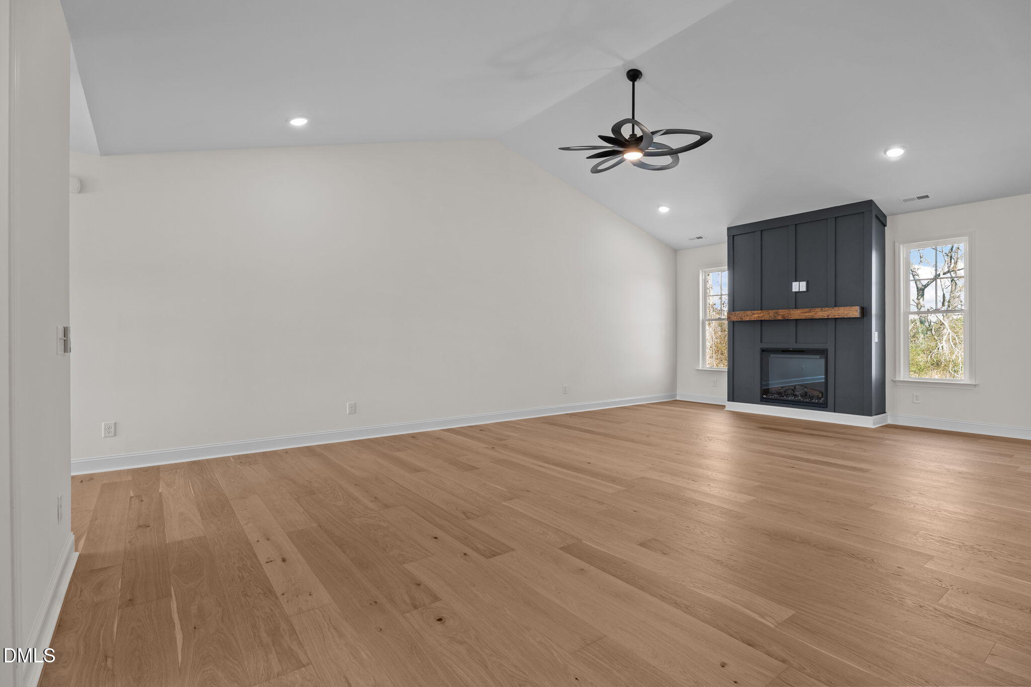2396 Heartland Road Battleboro, NC 27809 - Photo 27 of 49 a view of an empty room with a fireplace and a window