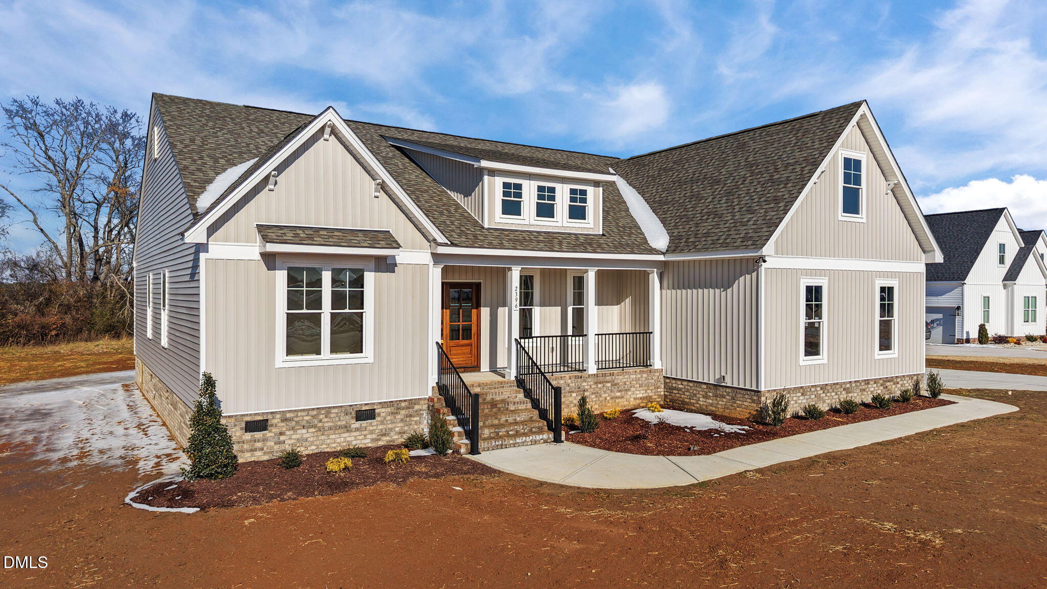 2396 Heartland Road Battleboro, NC 27809 - Photo 2 of 49 a front view of a house with a yard