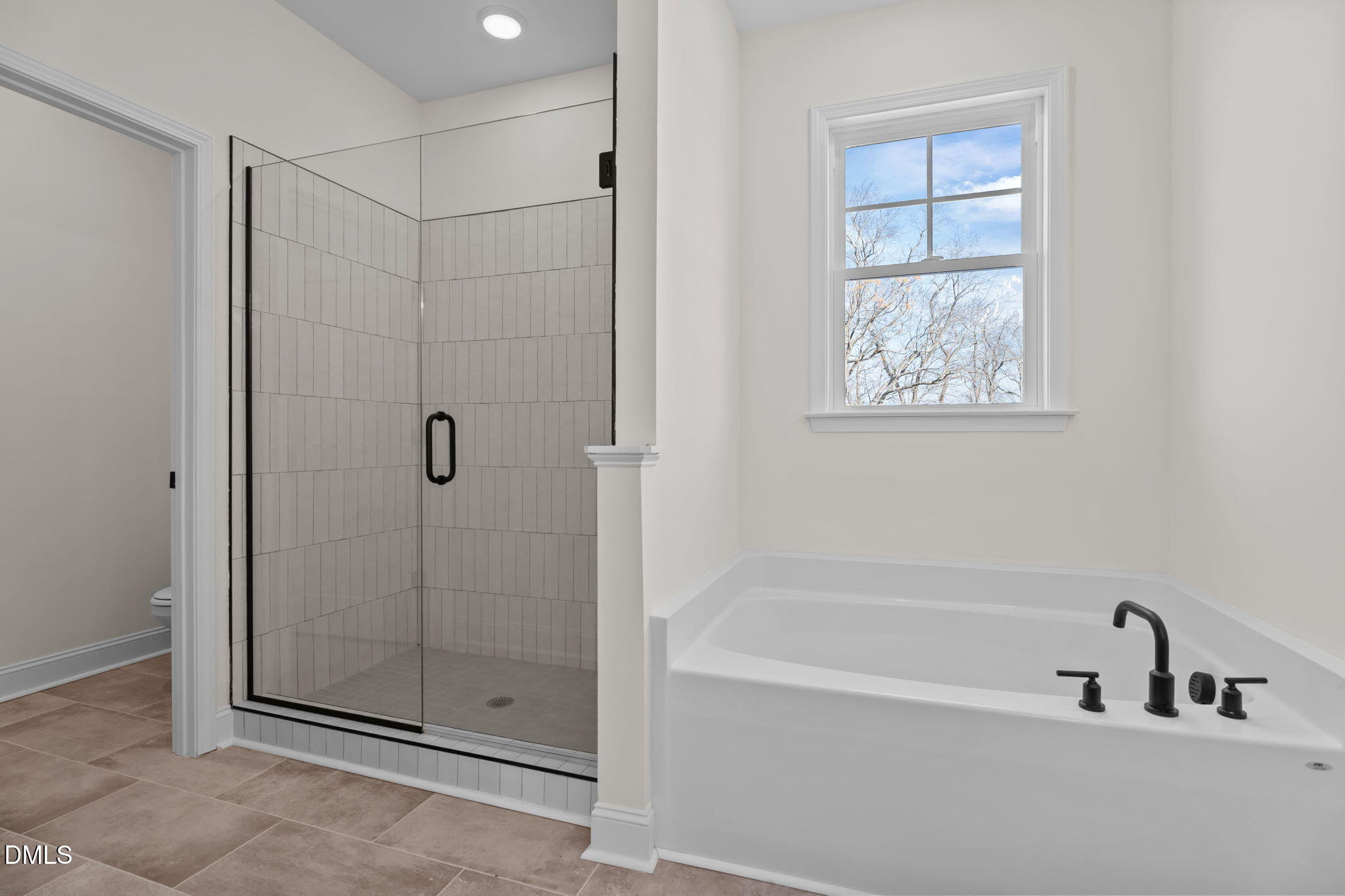 2396 Heartland Road Battleboro, NC 27809 - Photo 37 of 49 a bathroom with a bathtub and shower