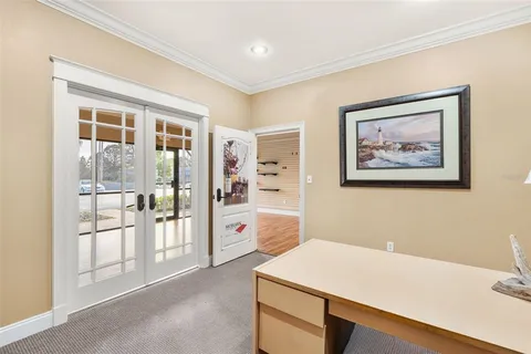 a workspace with furniture and window