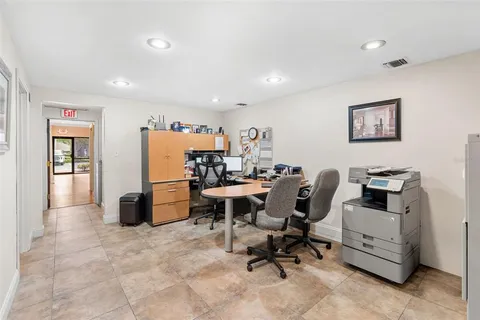 a view of a workspace with furniture