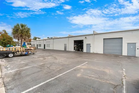 a view of parking space with city view