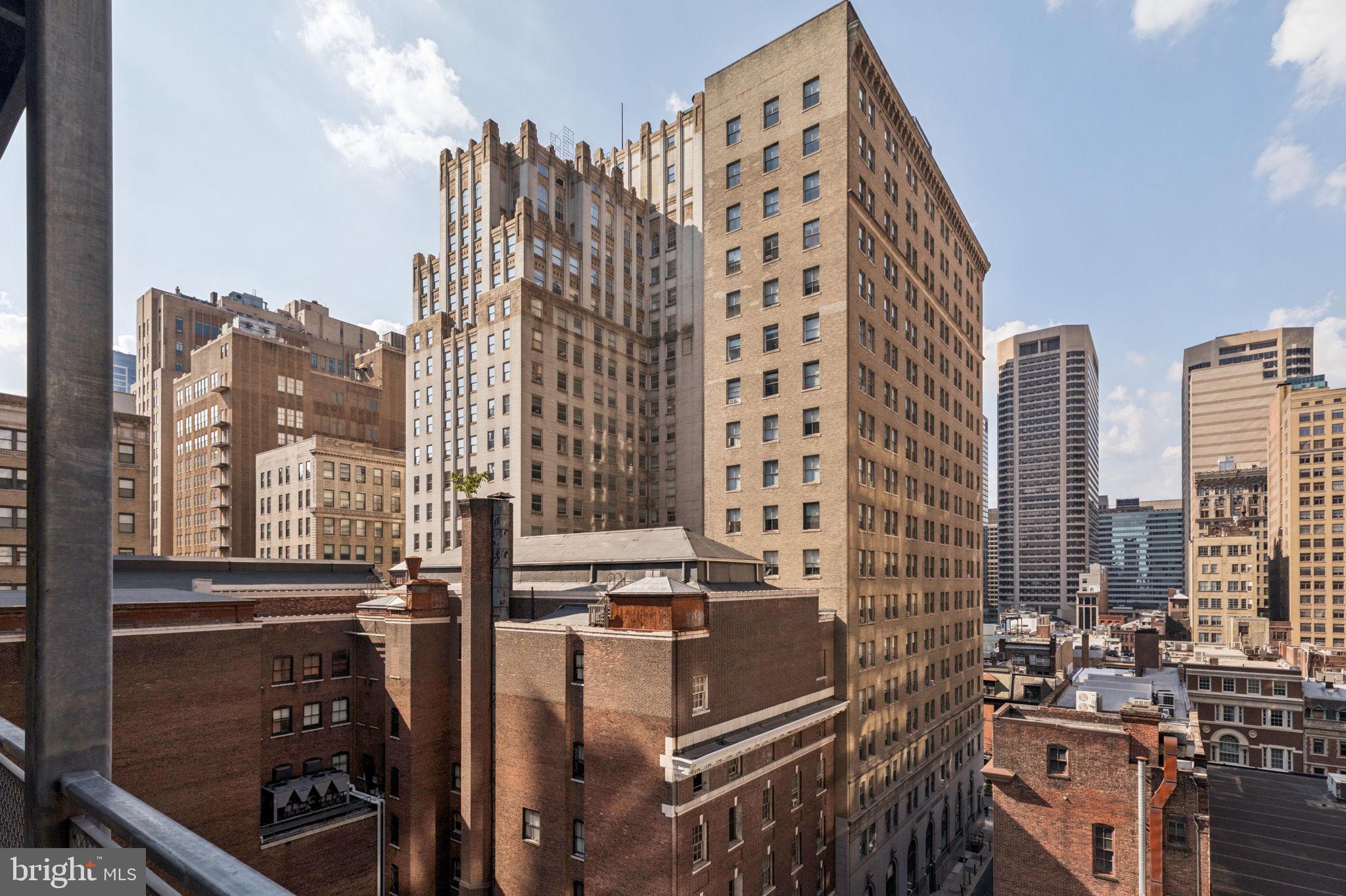1515 Locust Street, Unit 800 Philadelphia, PA 19102 - Photo 21 of 59 a view of a city with tall buildings