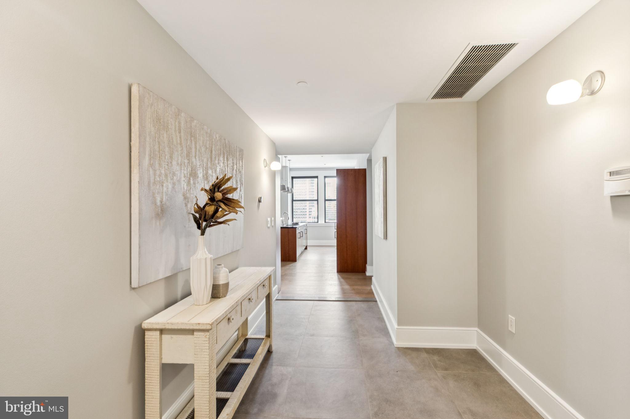 1515 Locust Street, Unit 800 Philadelphia, PA 19102 - Photo 33 of 59 a view of livingroom with furniture and front door