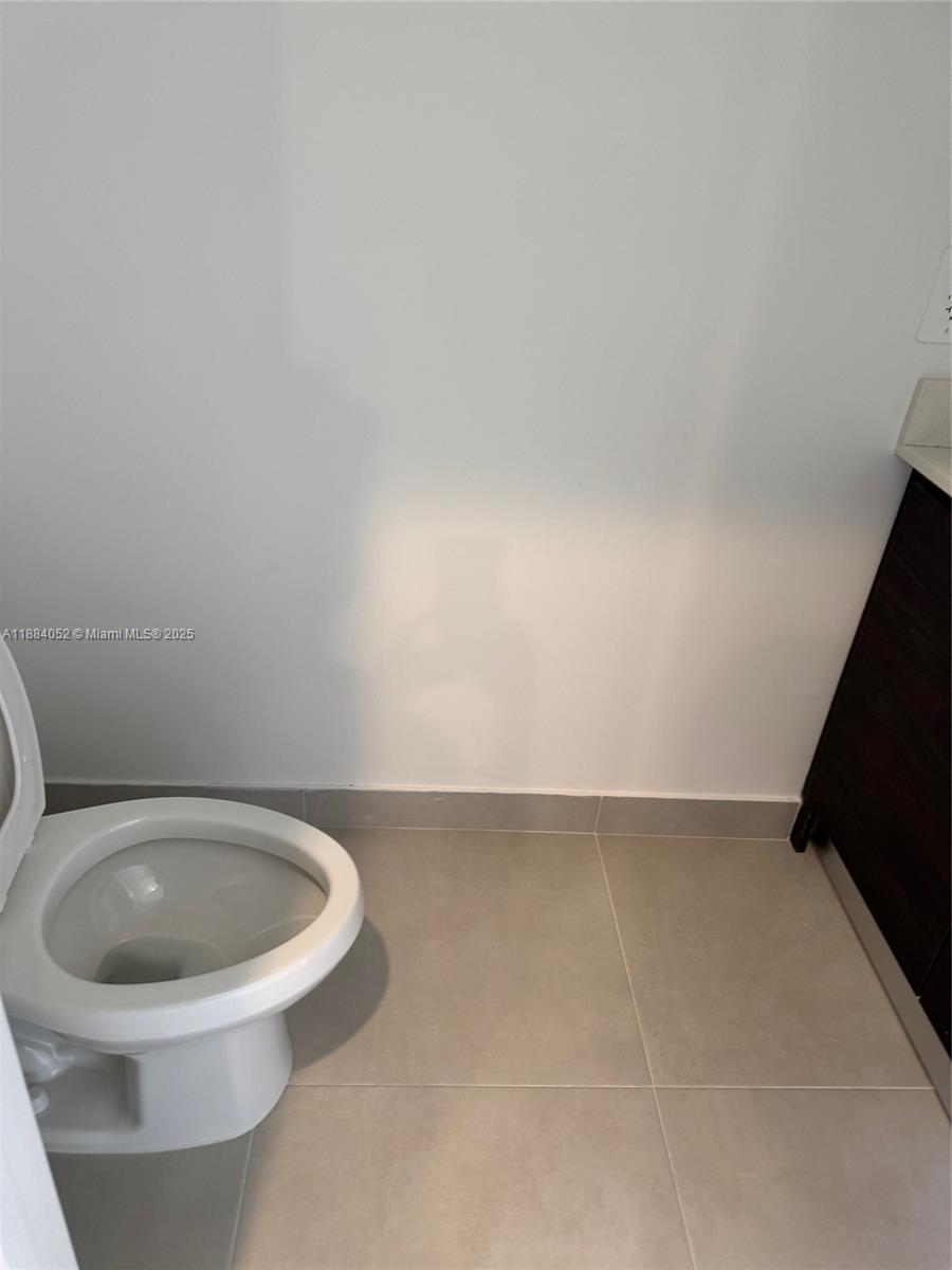 18951 Southwest 344th Terrace Homestead, FL 33034 - Photo 9 of 14 a bathroom with a toilet and a sink