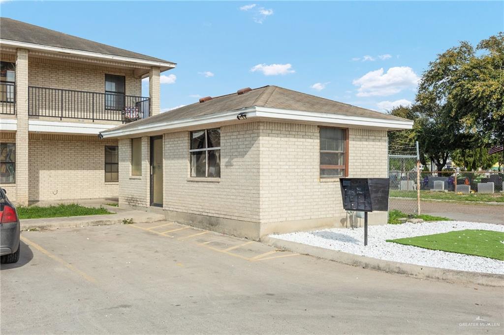 201 Fresno Avenue Roma, TX 78584 - Photo 12 of 20 a front view of a house with a yard and garage