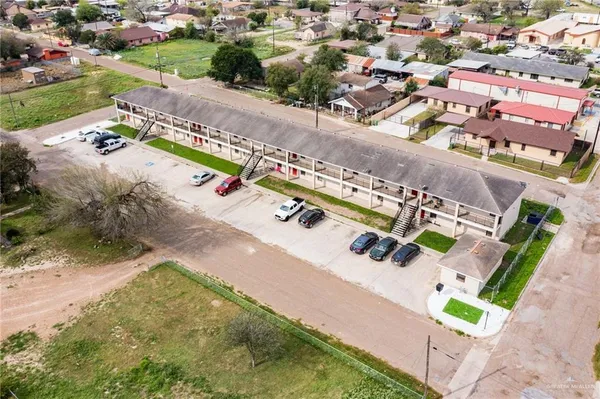 a view of building with a yard