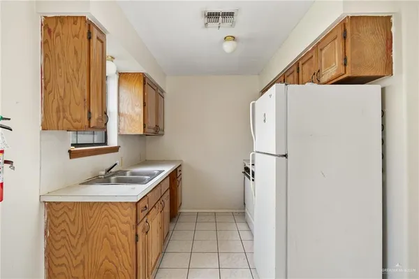 a utility room with window washer and dryer