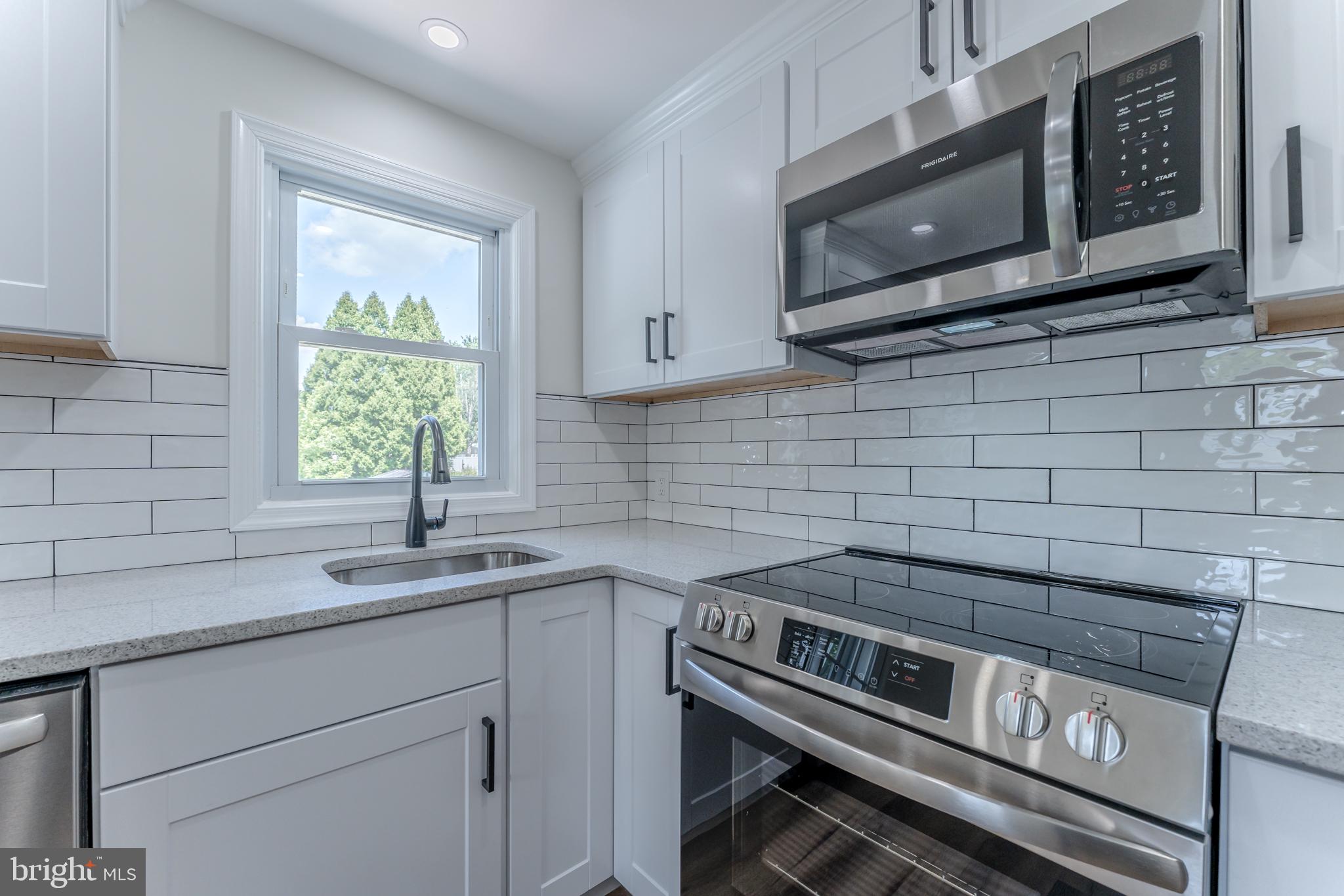 955 Bridge Road Collegeville, PA 19426 - Photo 15 of 71 Modern kitchen with sleek finishes.