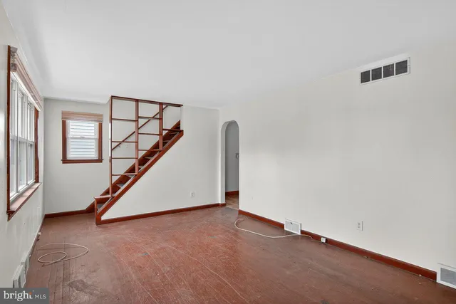 an empty room with windows