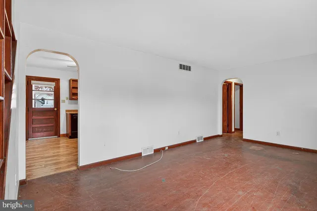 a bathroom with a toilet a sink and bathtub