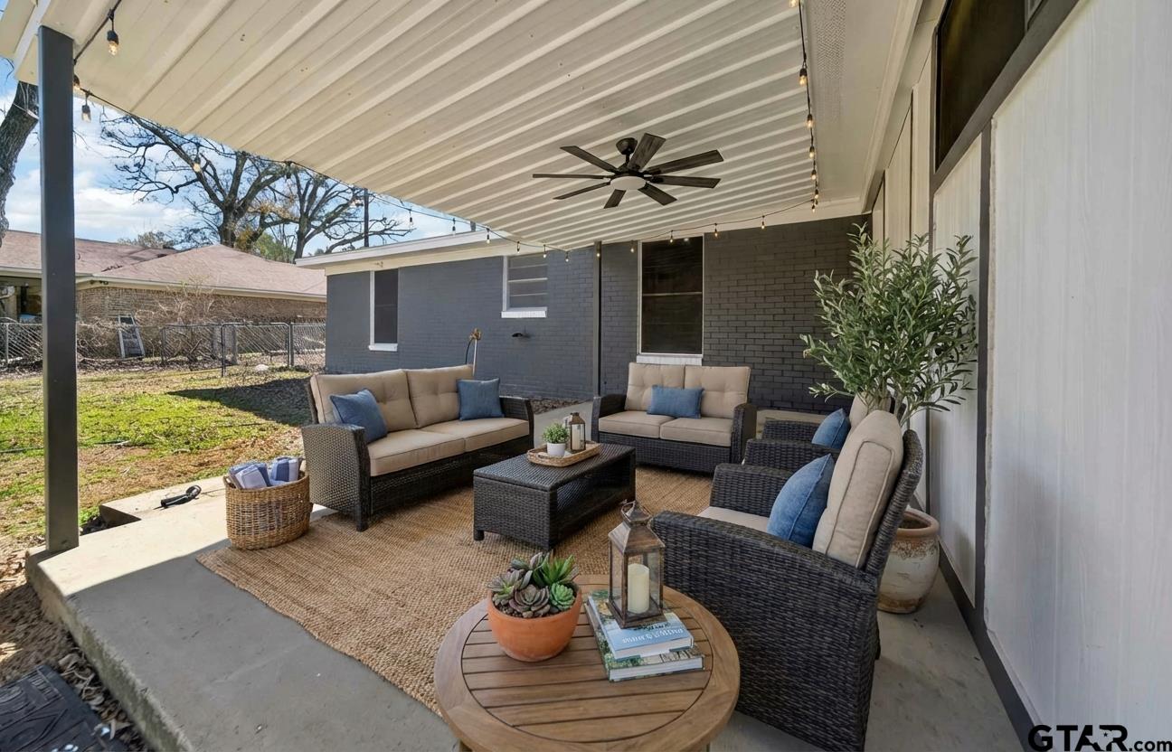 11457 State Highway 64 Tyler, TX 75707 - Photo 13 of 43 a outdoor living space with furniture and garden view