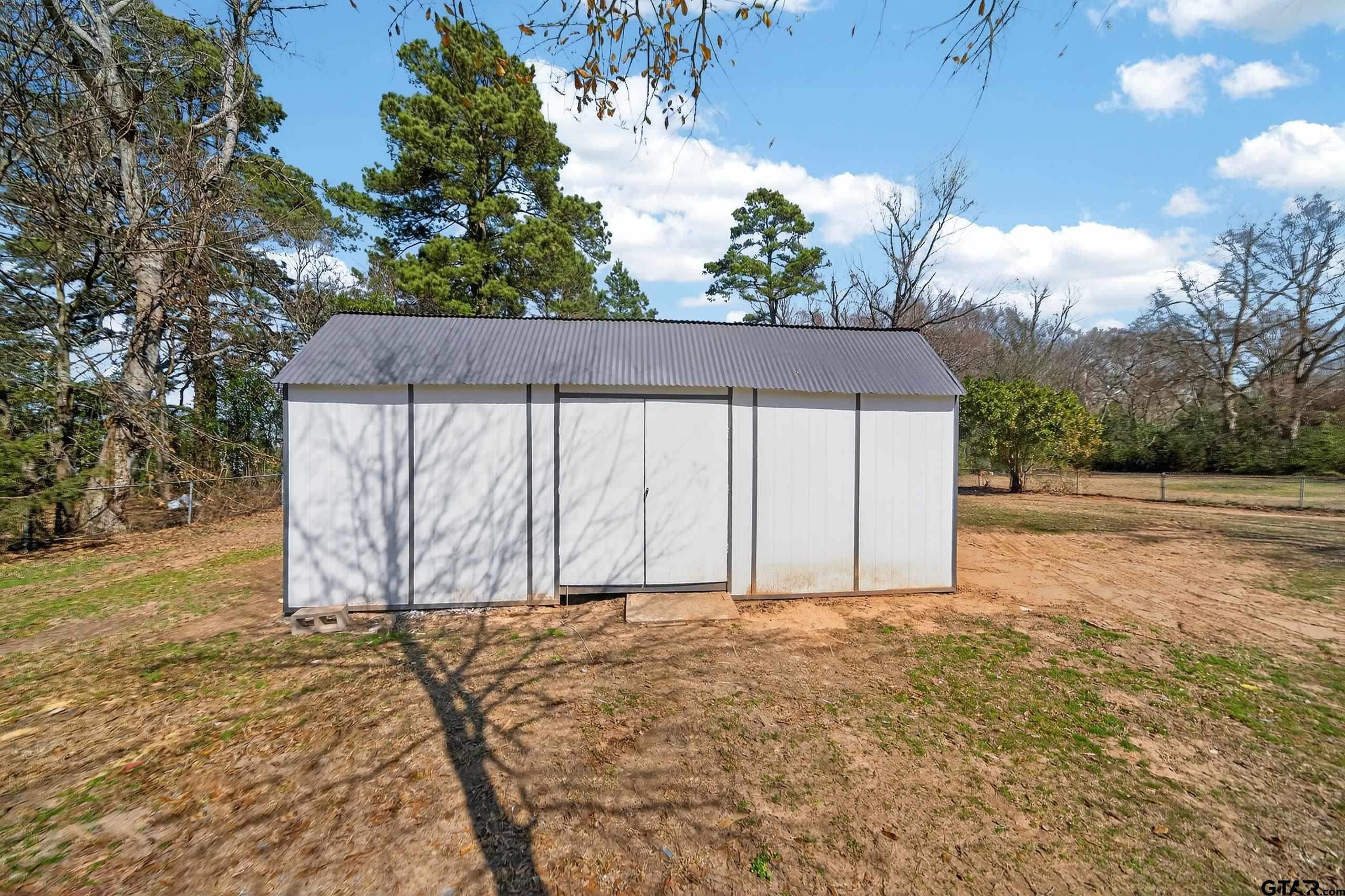 11457 State Highway 64 Tyler, TX 75707 - Photo 37 of 43 a view of backyard with green space