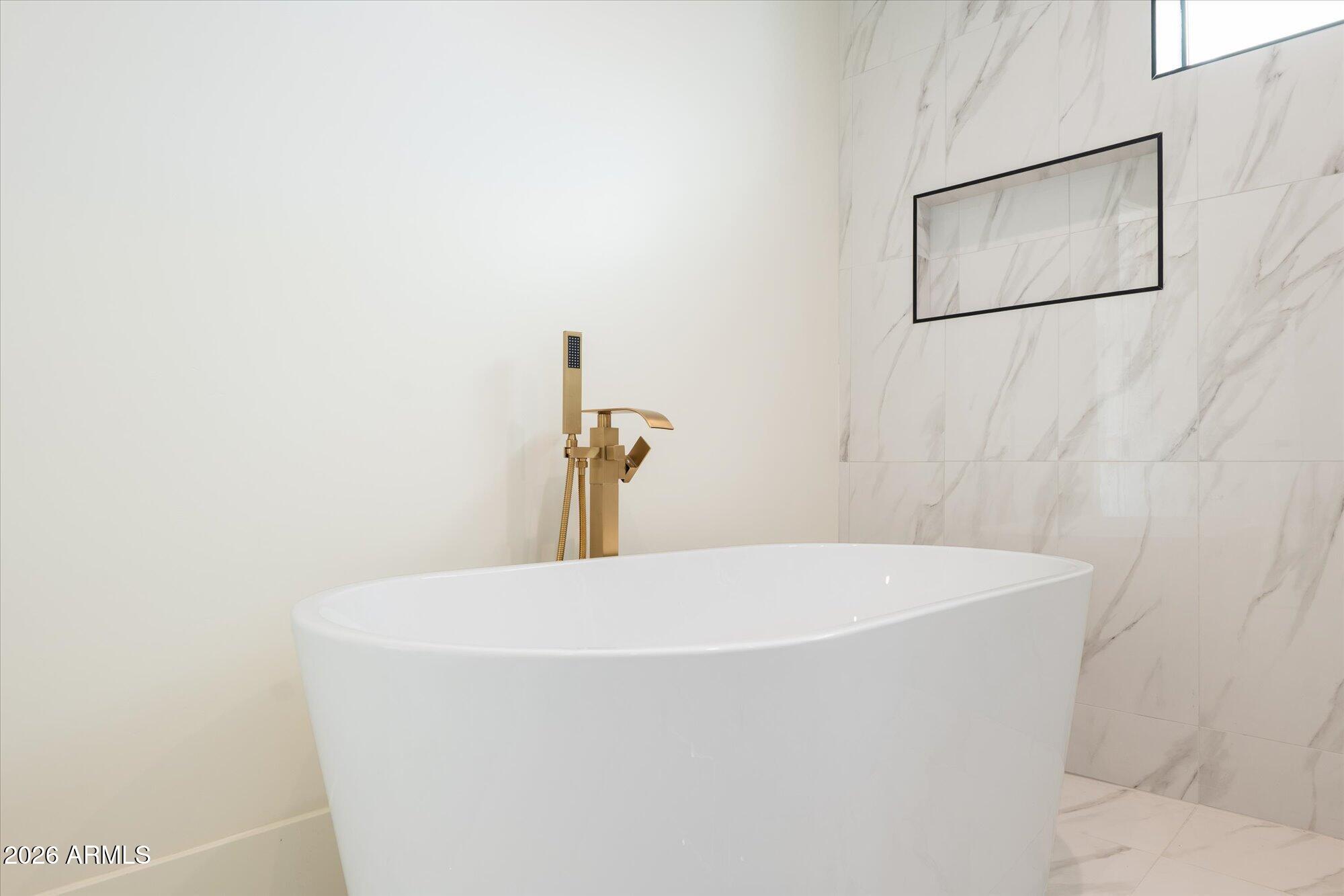 5861 East St John Road Scottsdale, AZ 85254 - Photo 28 of 60 a close up of a bathtub