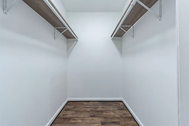 a view of a room with racks on the wall