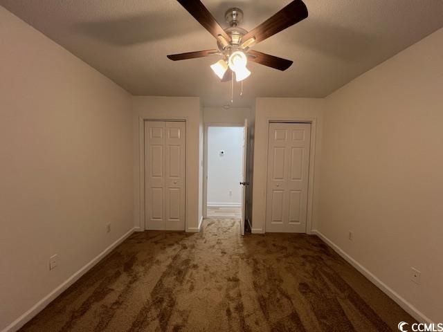 1809 Barberry Drive Conway, SC 29526 - Photo 11 of 16 Unfurnished bedroom featuring baseboards, two clos