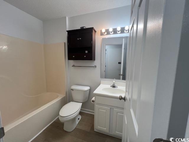 1809 Barberry Drive Conway, SC 29526 - Photo 12 of 16 Full bath featuring vanity, toilet, a textured cei
