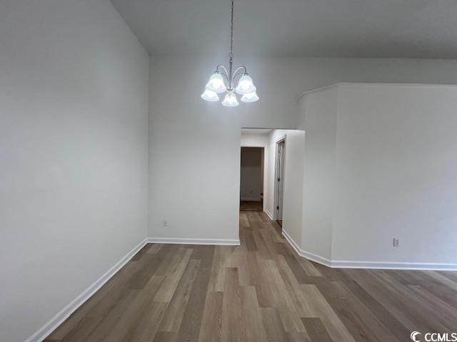 1809 Barberry Drive Conway, SC 29526 - Photo 6 of 16 Unfurnished dining area featuring baseboards, wood