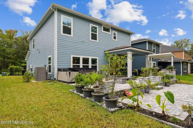 a view of a chairs and table in a patio
