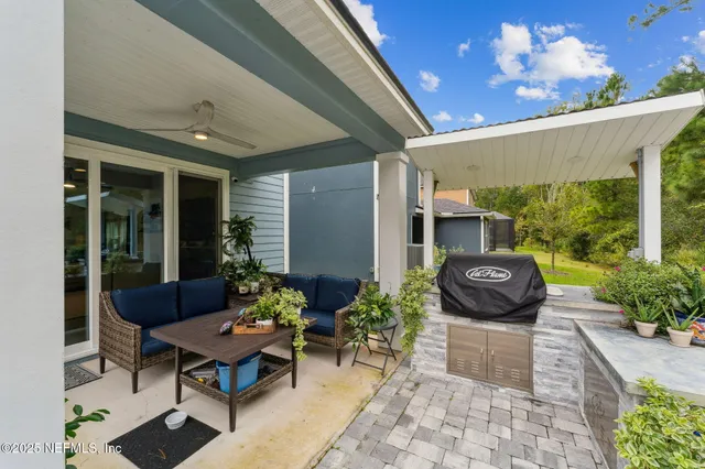 a view of swimming pool with a patio