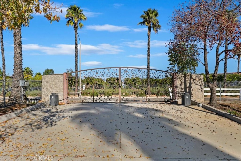 18590 Roberts Road Riverside, CA 92508 - Photo 11 of 66 a view of a road with a large trees