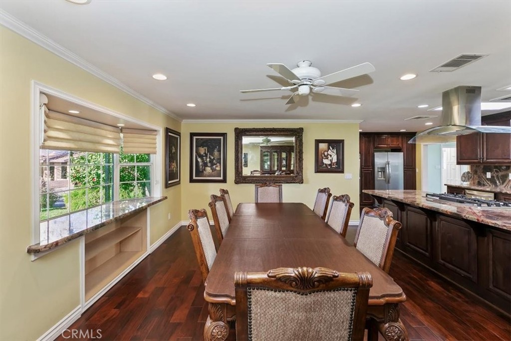 18590 Roberts Road Riverside, CA 92508 - Photo 31 of 66 a view of a dining room with furniture window and wooden floor
