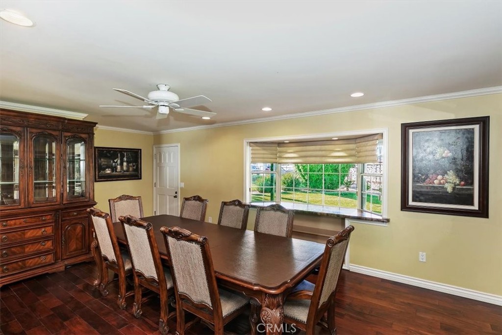18590 Roberts Road Riverside, CA 92508 - Photo 32 of 66 a view of a dining room with furniture window and wooden floor