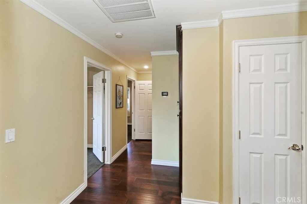 18590 Roberts Road Riverside, CA 92508 - Photo 37 of 66 a view of a hallway with wooden floor