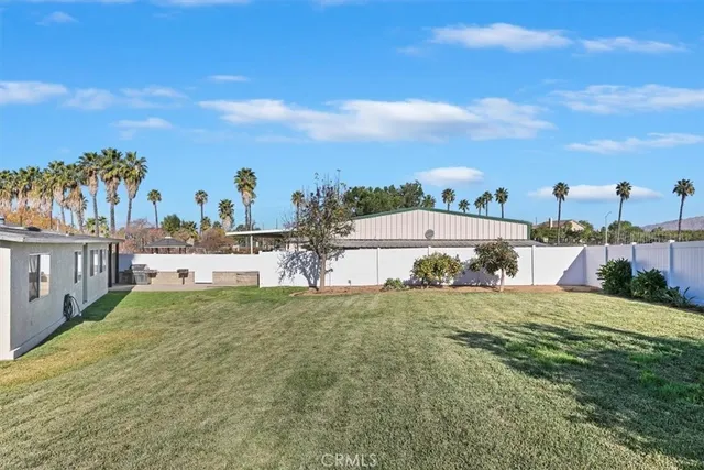 a view of a garden with a lake
